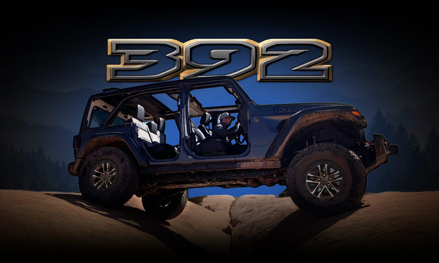 A passenger-side profile of a 2024 Jeep Wrangler Rubicon 392, with its doors removed and its sunroof opened, positioned directly over a deep crevice created by two boulders. 392.